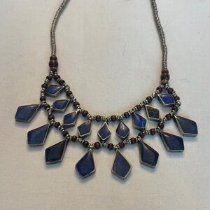 Elegant Blue and Silver Necklace with Geometric Charms